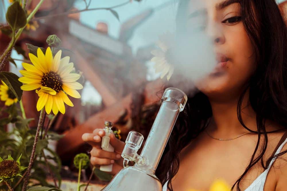 beautiful female smoking weed