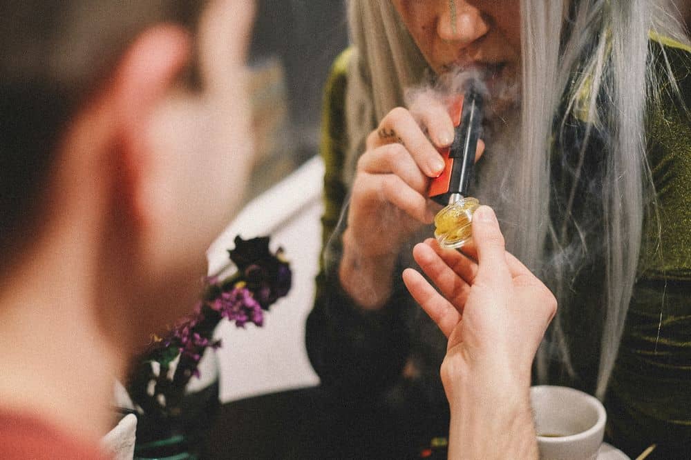 stoners consuming cannabis dabs