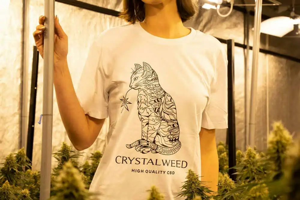 woman wearing crystalweed cannabis shirt